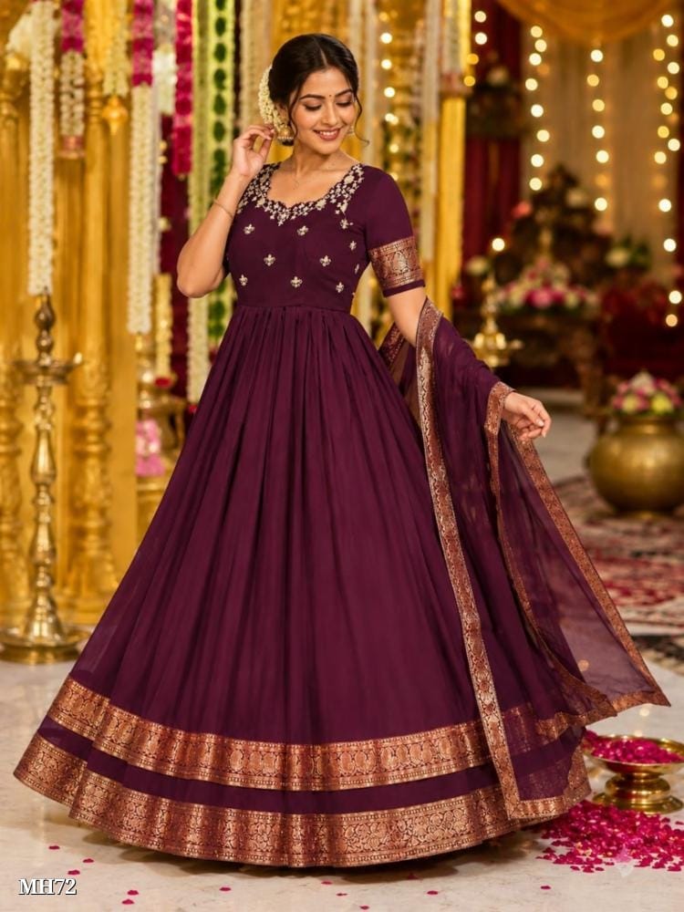 wine color silk blend gown with floral embroidery and zari border wine color silk blend gown with floral embroidery and zari border