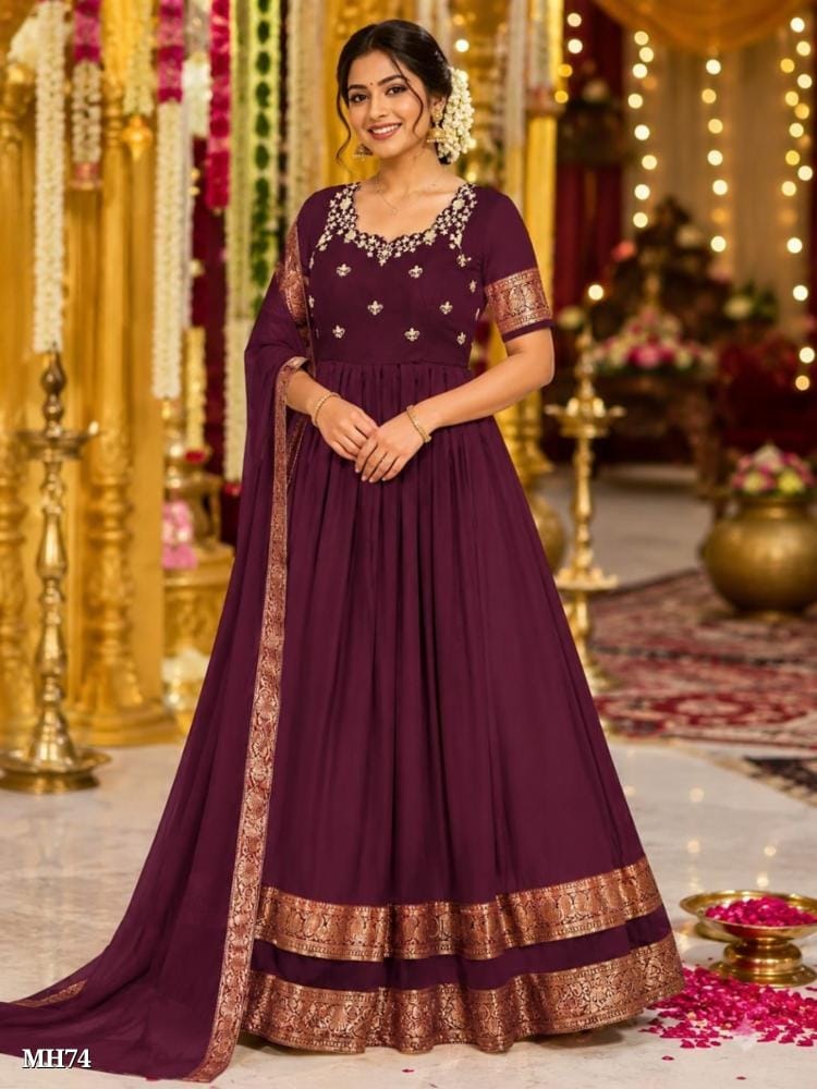 wine color silk blend gown with floral embroidery and zari border wine color silk blend gown with floral embroidery and zari border